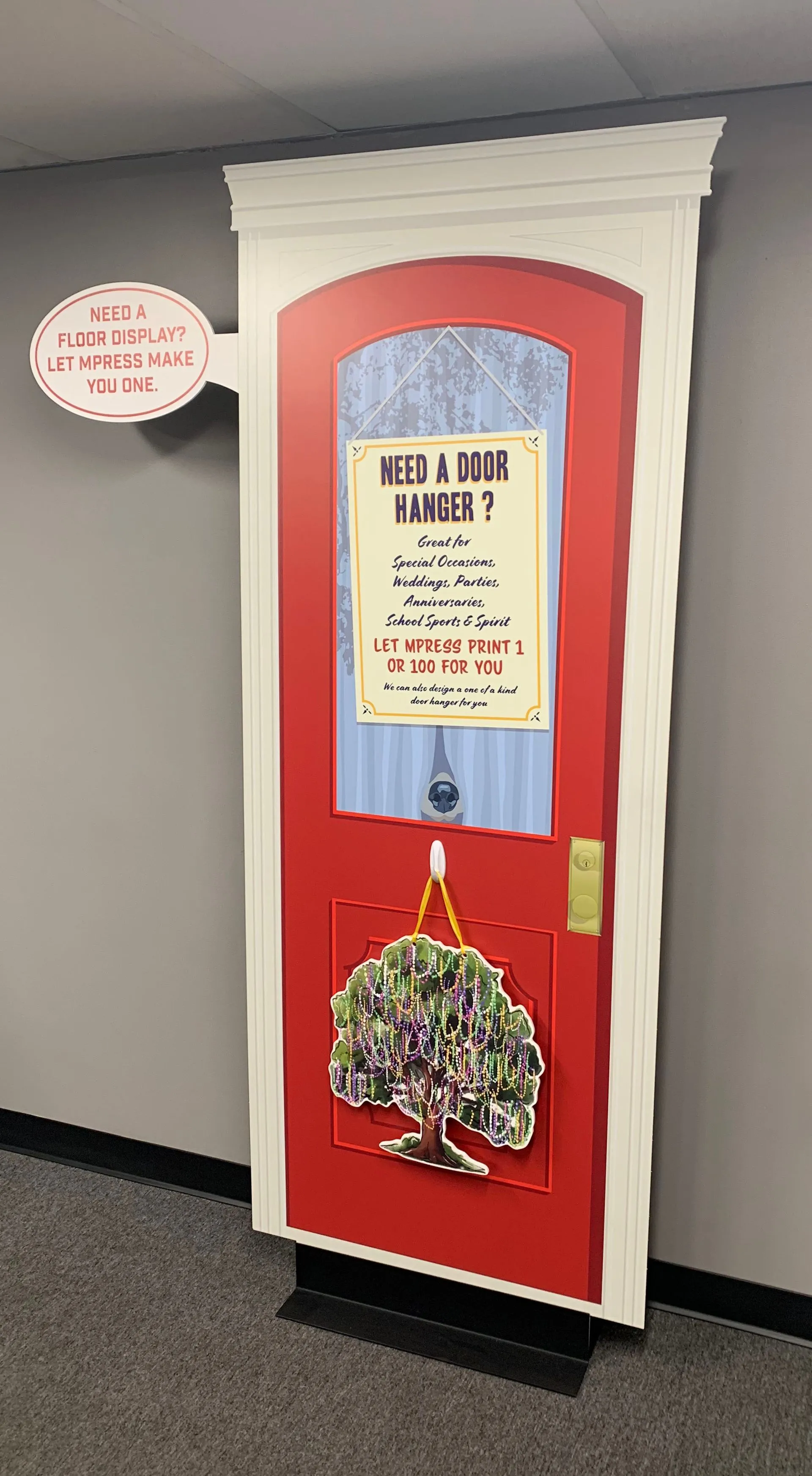 Printed door standee point of purchase display